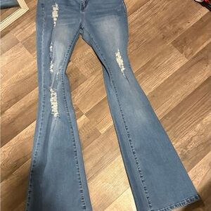 Women's Distressed Blue Jeans